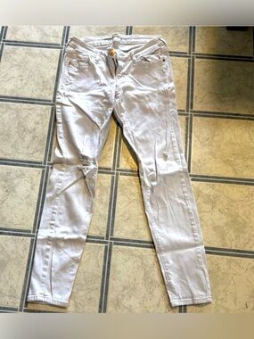Old Navy Rockstar Low Rise White Distressed Skinny Jeans